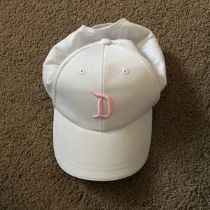 Pink and white ball cap